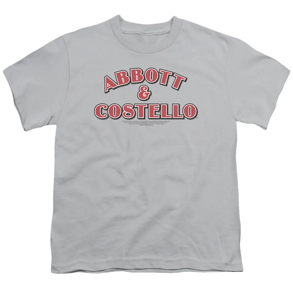Youth silver t-shirt with red and black Abbott & Costello logo on front, crew neck and short sleeves.