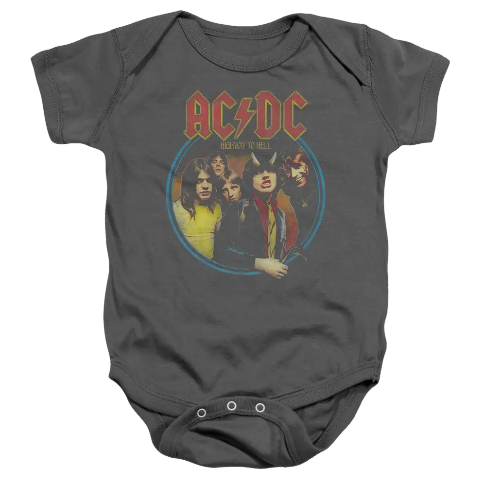 Charcoal baby bodysuit with vintage AC/DC Highway To Hell band graphic and logo on front.