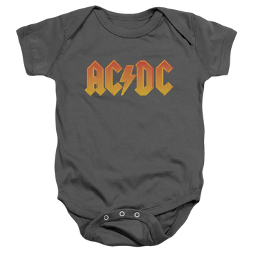 Charcoal baby bodysuit with orange and yellow AC/DC logo across chest and snap closures at bottom.