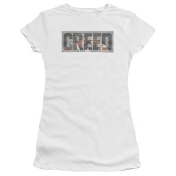 White juniors t-shirt with Creed Pep Talk graphic